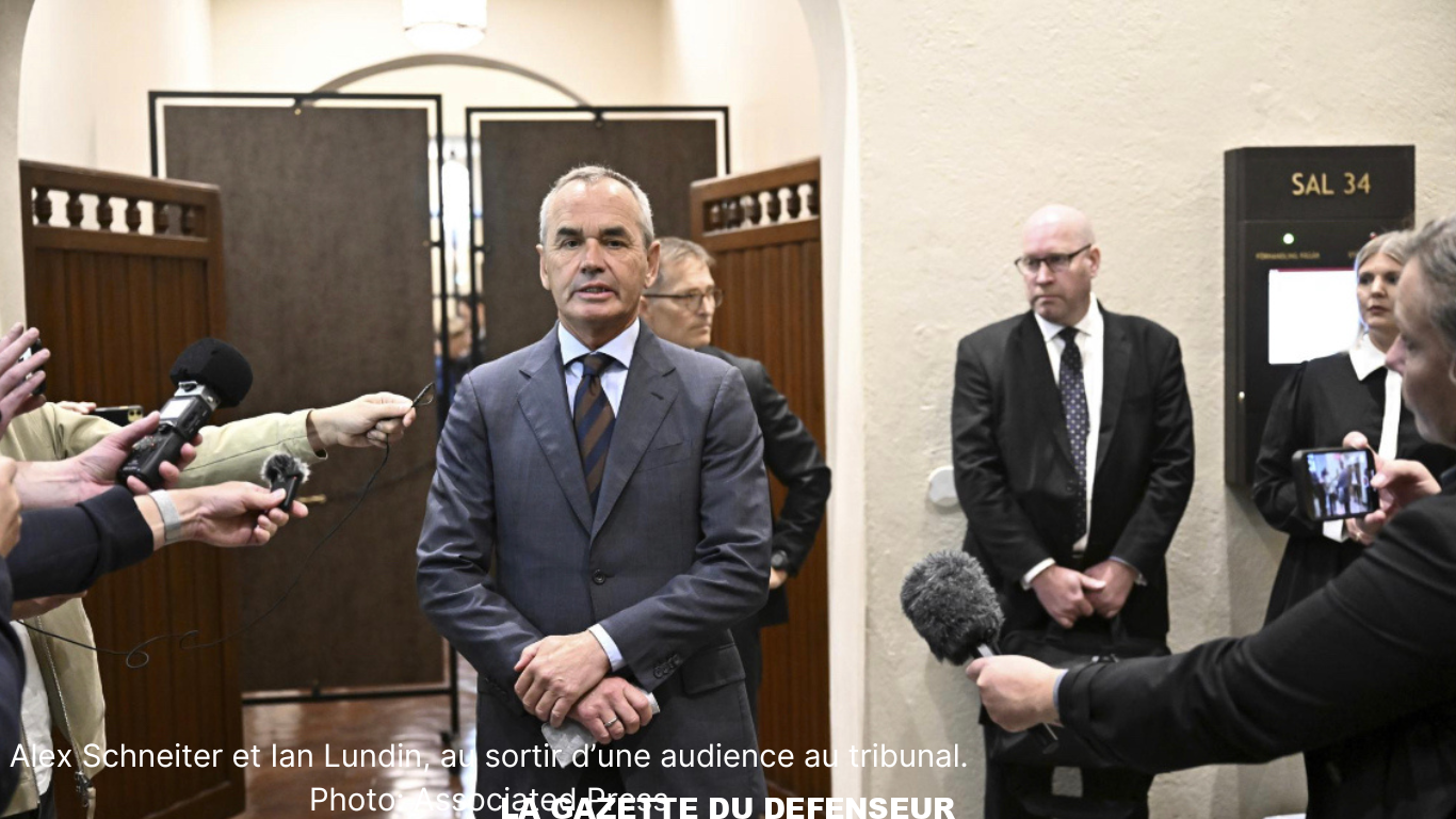 Alex Schneiter et Ian Lundin, au sortir d’une audience au tribunal. Photo Associated Press