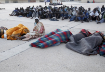 Libye: 21 corps de migrants découverts dans une fosse commune