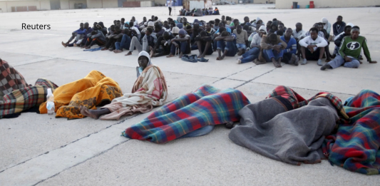 Libye: 21 corps de migrants découverts dans une fosse commune